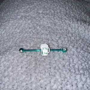 Green Industrial Barbell Piercing